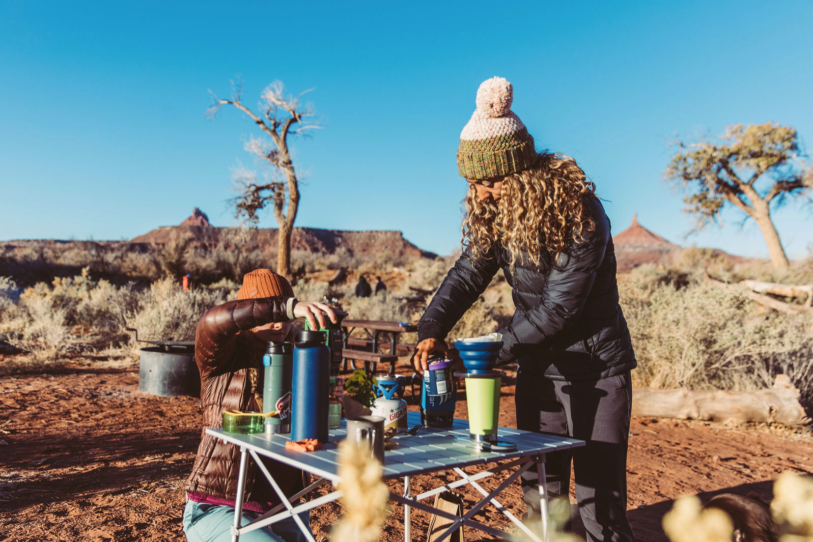 climbers drinking coffee in BUFF hats